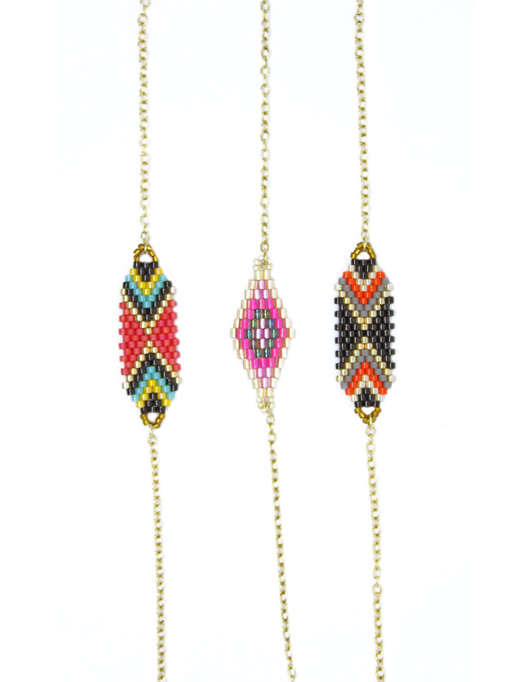 Bracelet with Miyuki charm and 14K gold-plated chain.